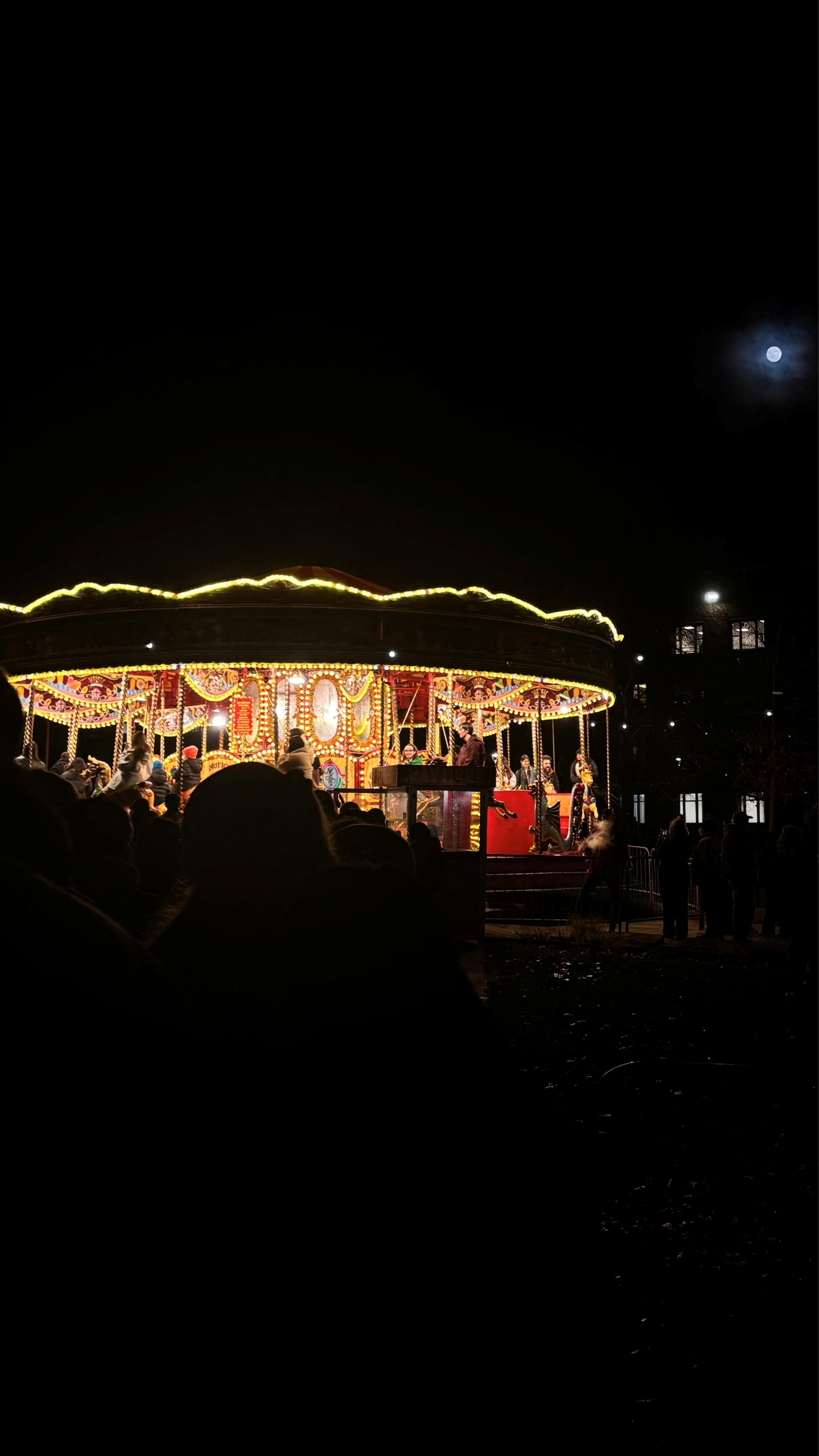 A merry-go-round lit up at night