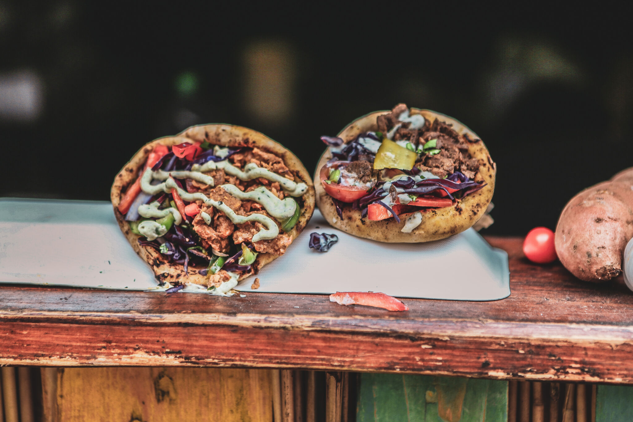 Vegan gyros laid on a wooden table